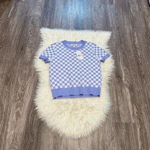 nik & leksi periwinkle & white checkerboard short sleeved sweater from Bealls.